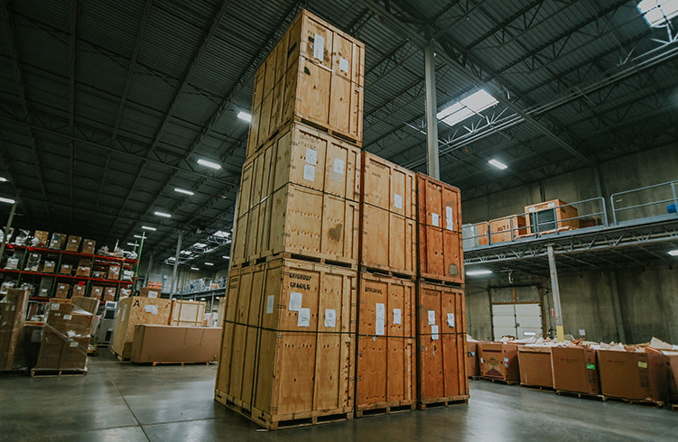 Planes moving crates in warehouse
