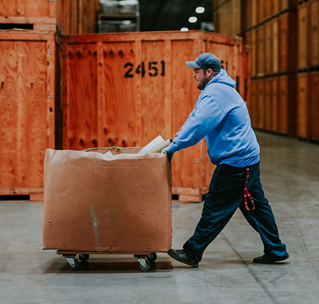 pushing box through warehouse