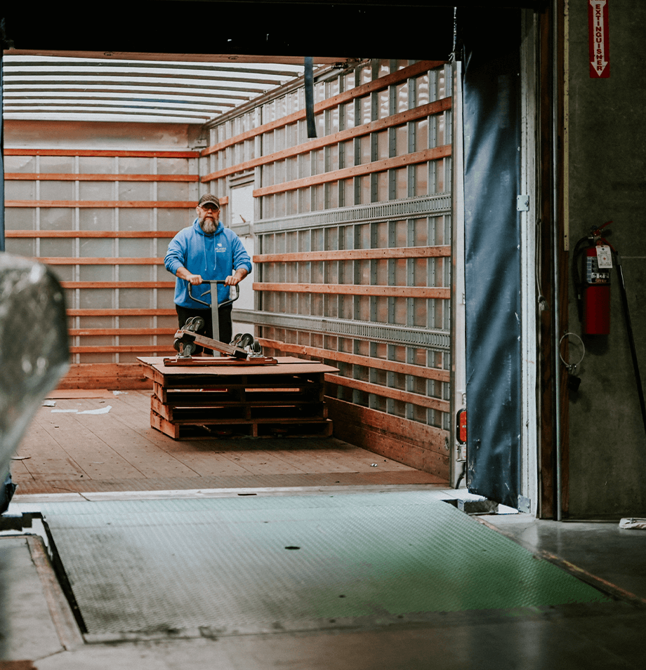 Planes employee unloading the truck